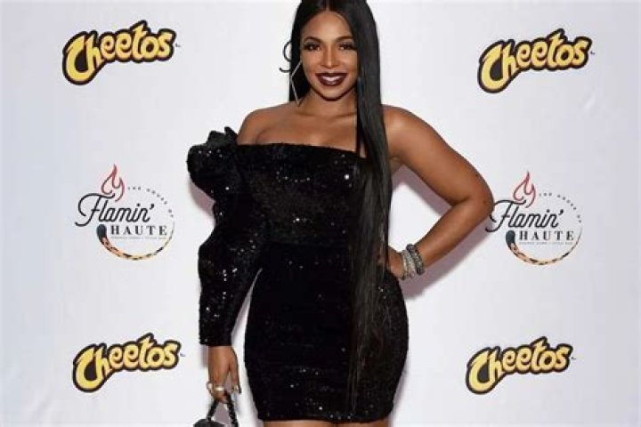 Ashanti Leaves Little To The Imagination As She Plays On A Bed In New Photos — Diva Looks So Good That Fans Are Now Bashing Nelly For Letting Her Go