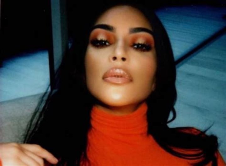 Kim Kardashian West Glows In Orange In New Photos