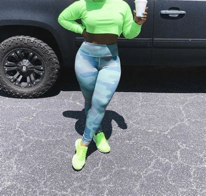 Reginae Carter Puts Her Hourglass Figure On Display, While Spreading Neon Vibes