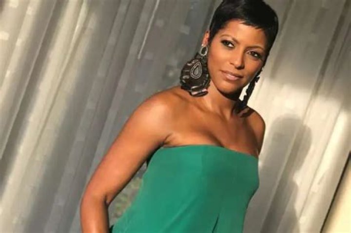Tamron Hall Shows Off Gorgeous Tattoo In Floral Bathing Suit Pictures While Chilling In The Pool With Baby Moses And Husband Steven Greener